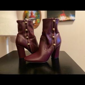 Wine Mid-Calf Booties with Gold Buttons.